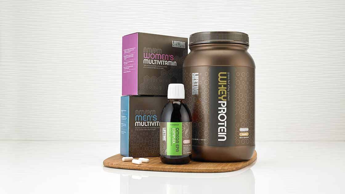 Two boxes, a jar, a bottle and a few loose capsules of nutritional supplements and products