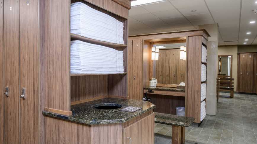 folded towels in the locker room at life time